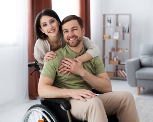 Smiling couple receiving care through trusted NDIS support service